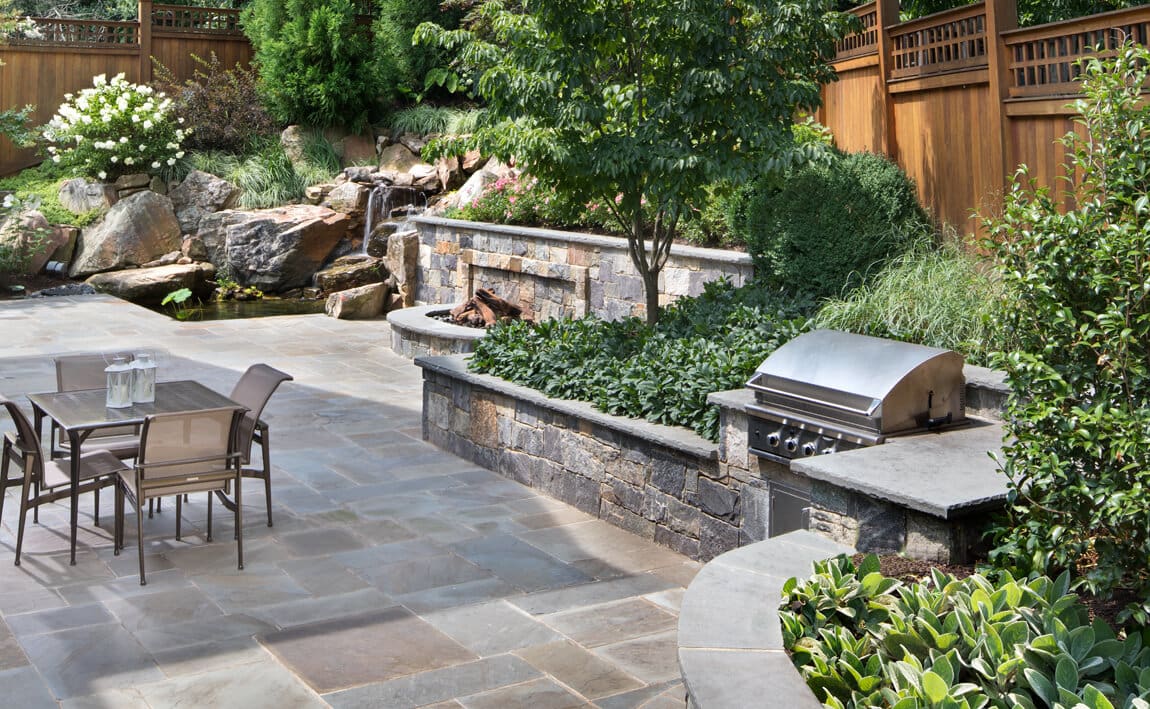 grill built into retaining wall Surrounds Landscape Architecture