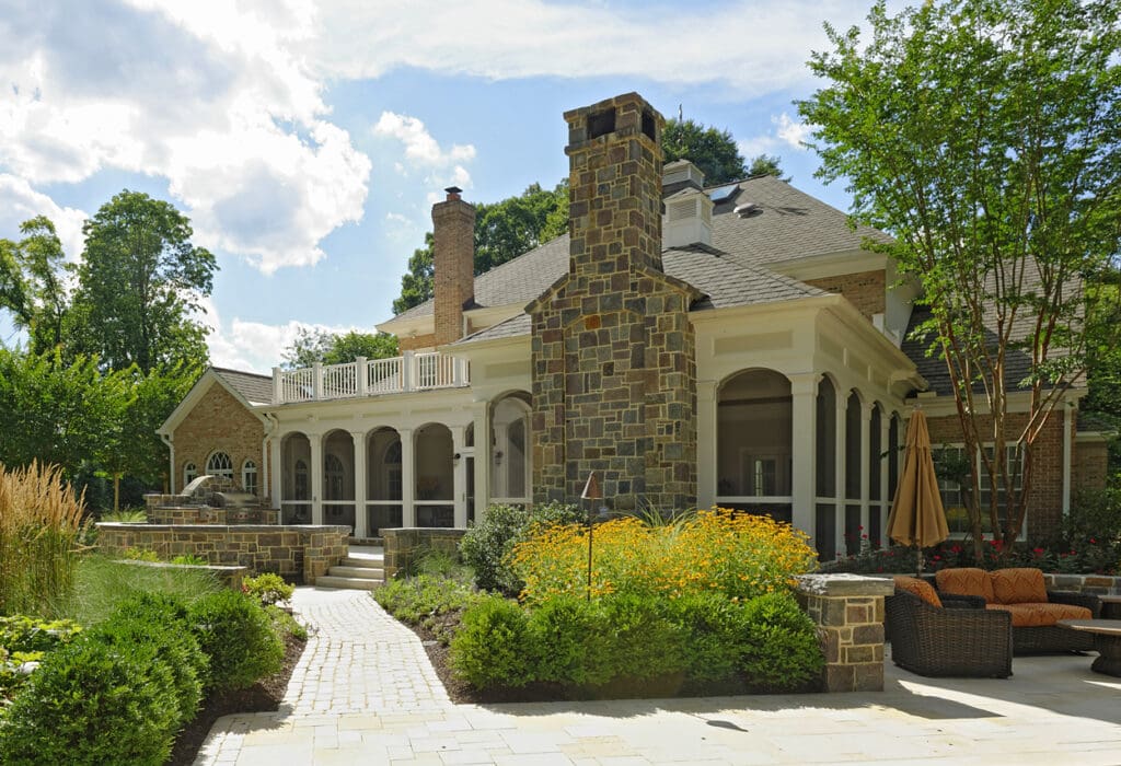 porch design with stone chimney