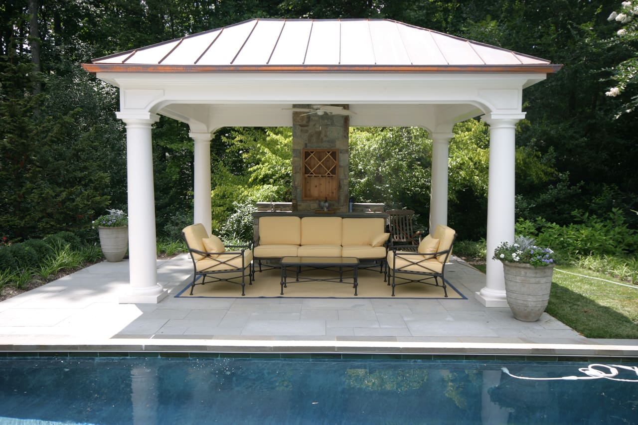 Great Falls pool house with wet bar and wine storage racks