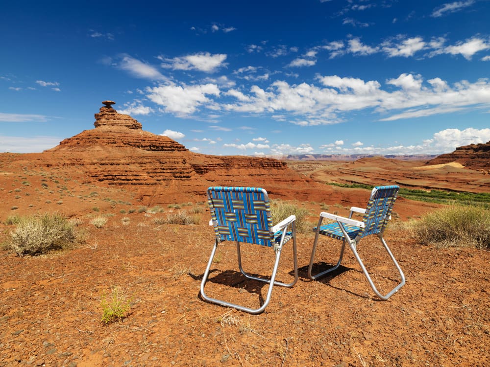 lawn chairs in desert