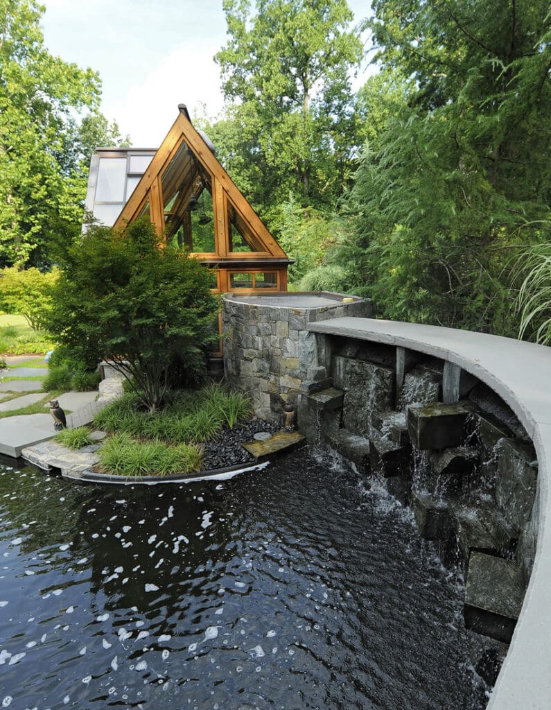 stonewall-connects-greenhouse-to-koi-pond