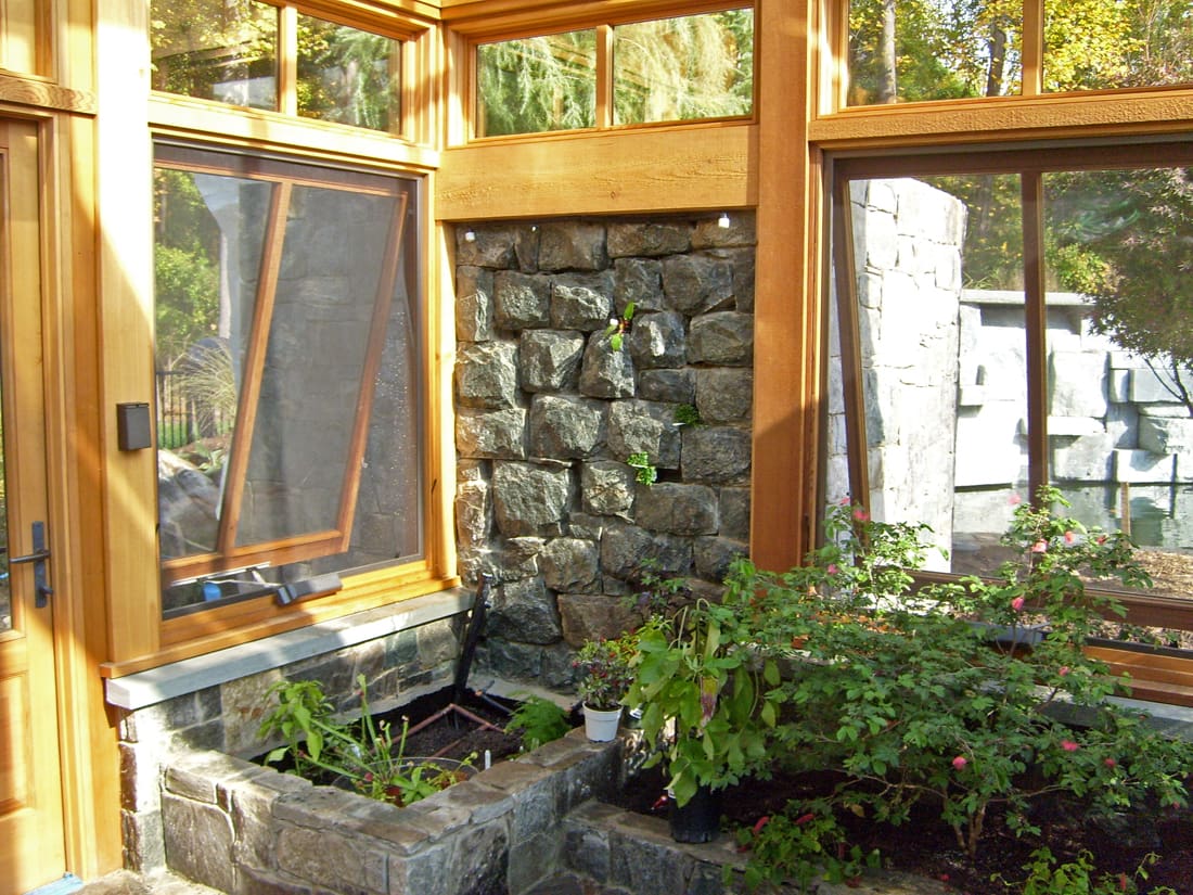 greenhouse-interior-stone-wall-integration