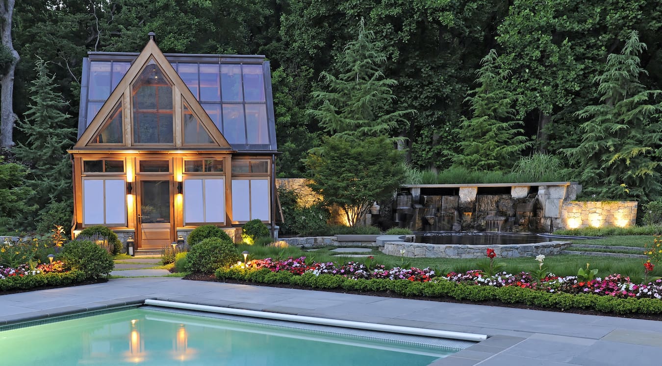oakton-va-greenhouse-waterfall-koi-pond-at-night