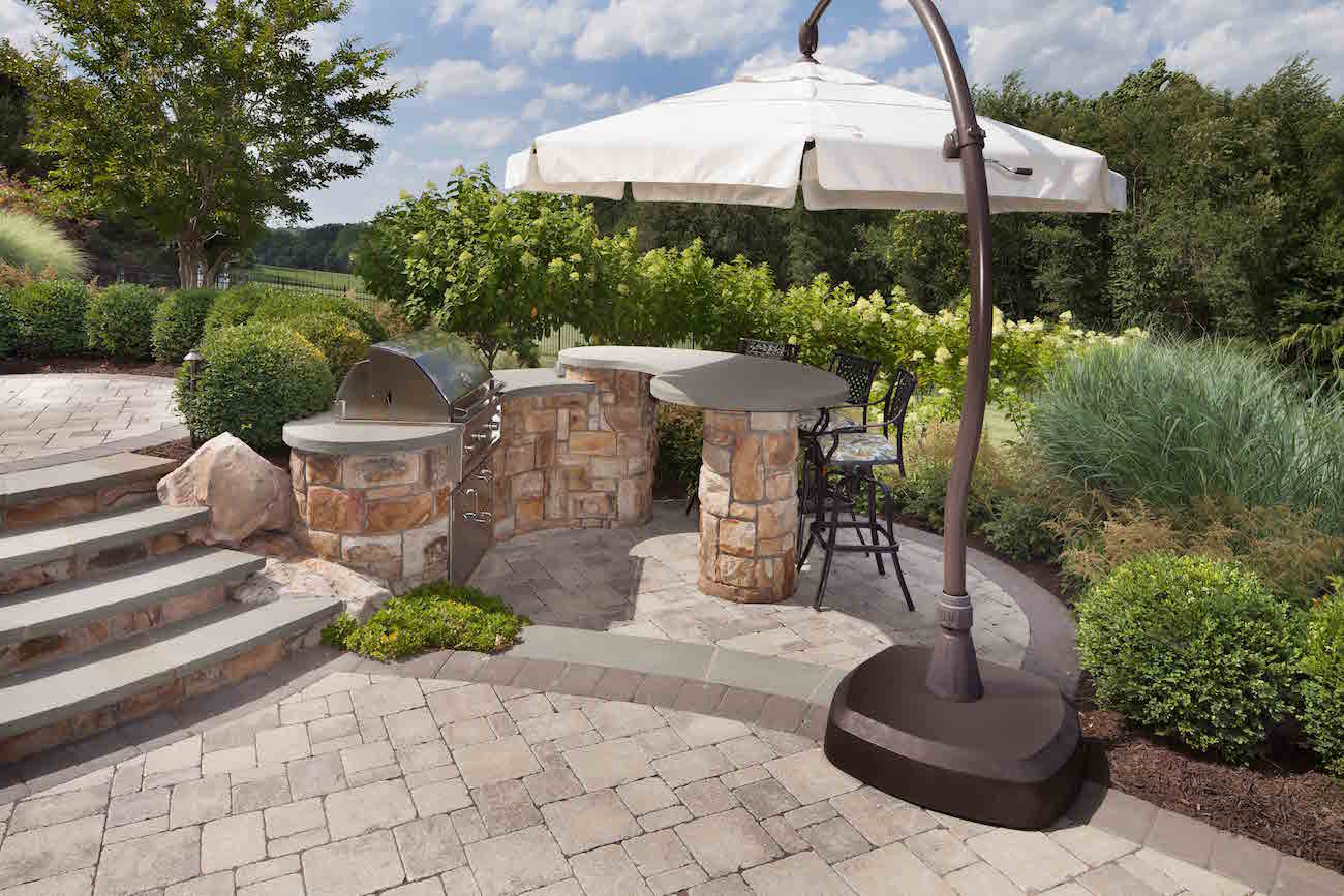 outdoor grill station and raised patio