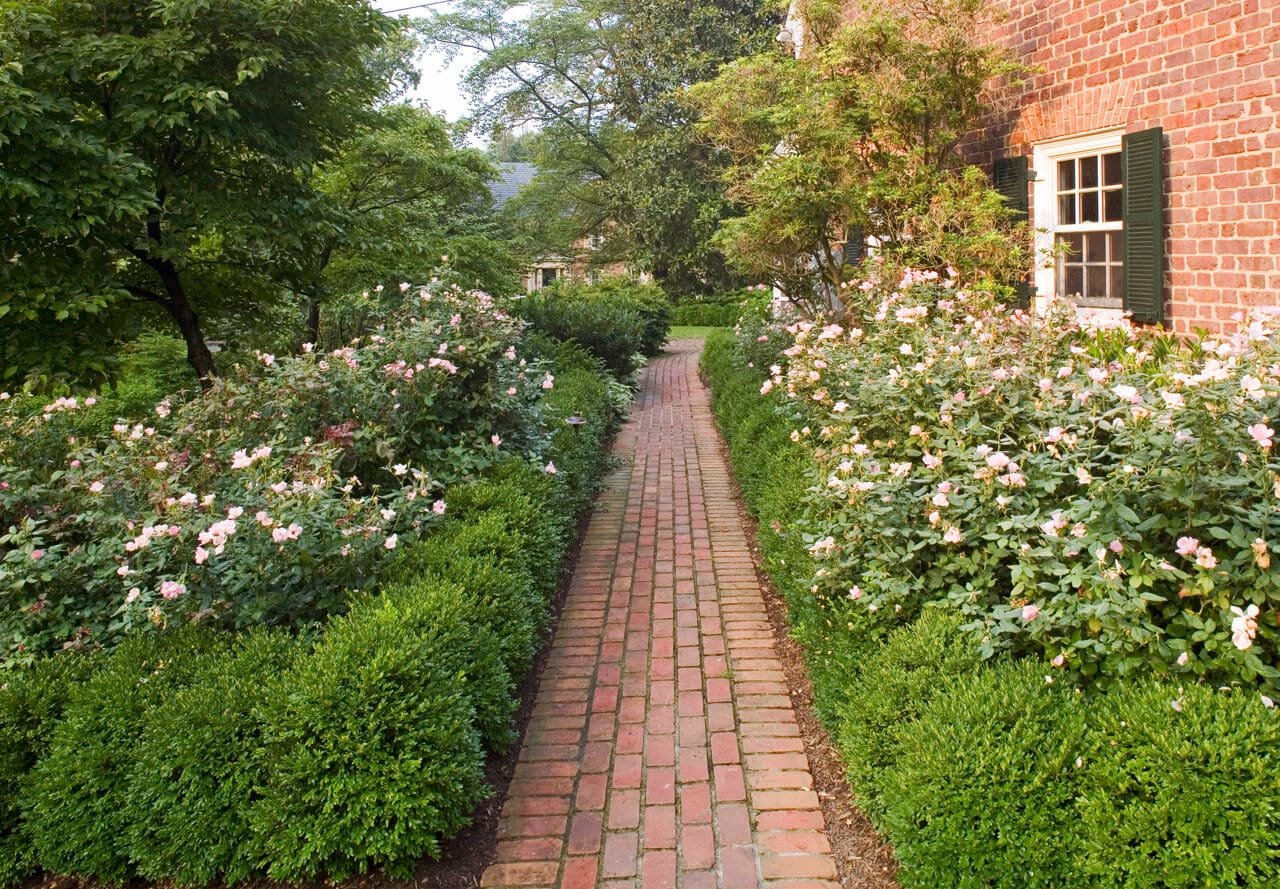 permeable brick walkway with natural border plantings