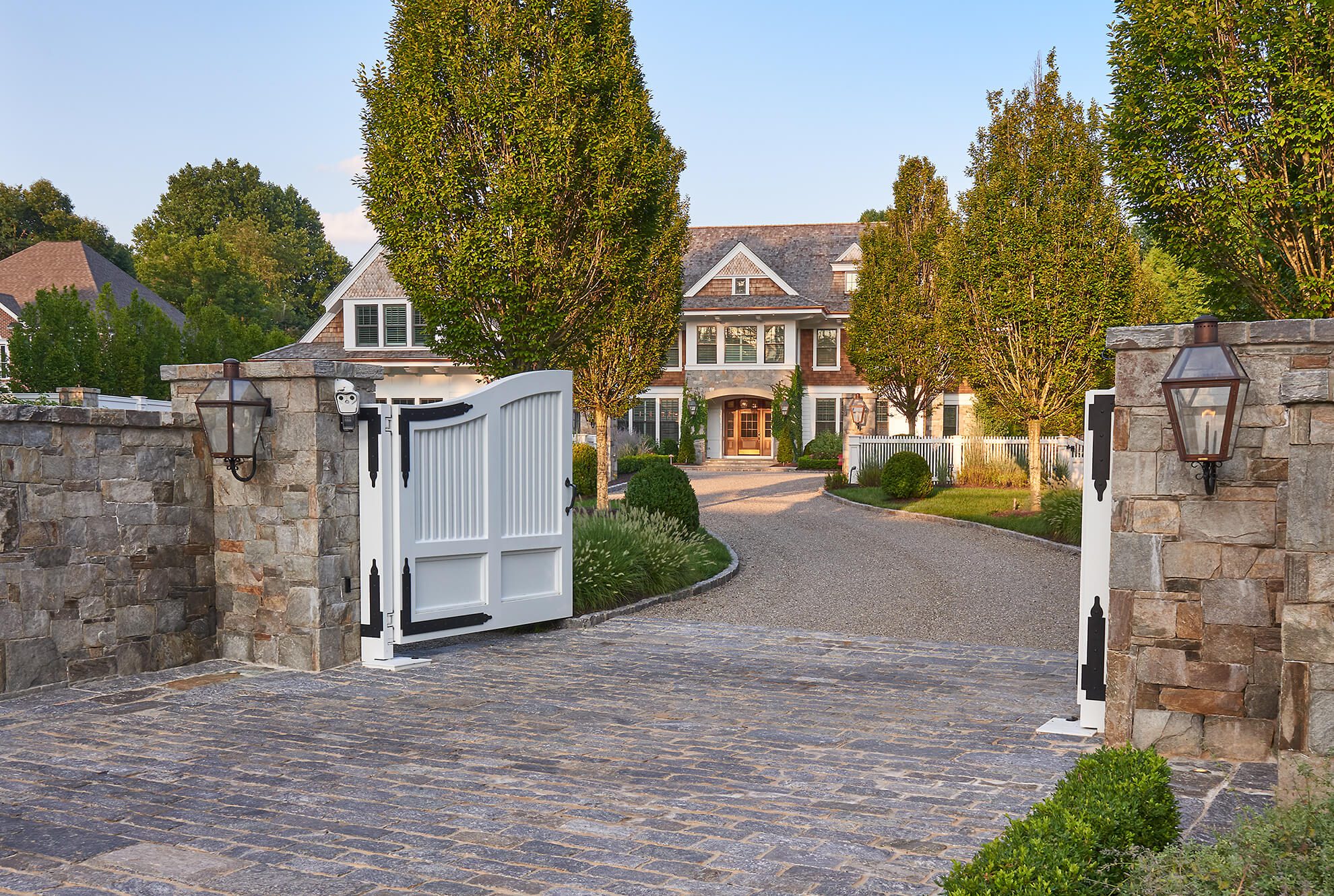 front yard driveway entry gate and privacy wall