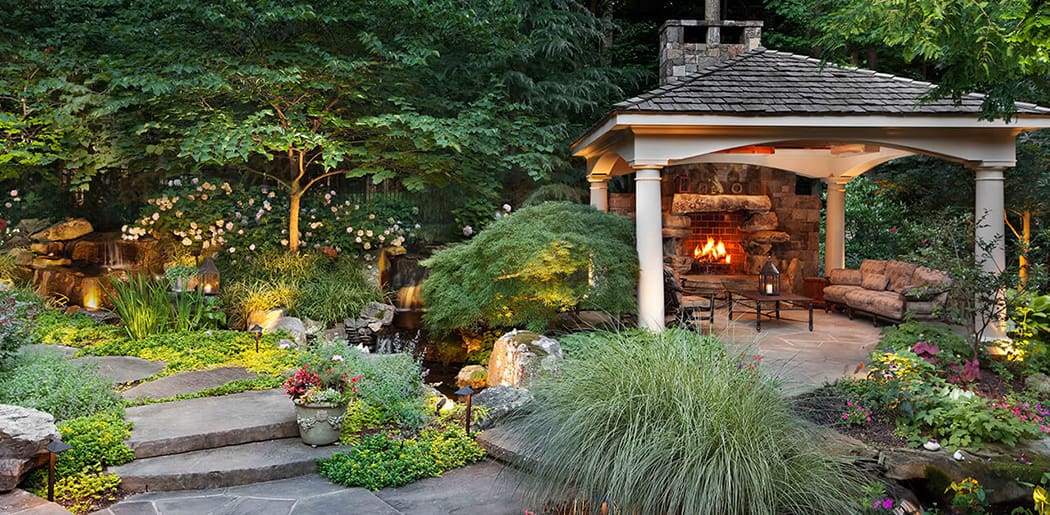 backyard fireplace in secluded pavilion