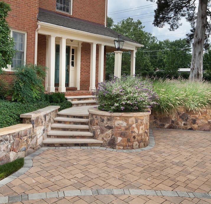 paver driveway and slab stone walkway