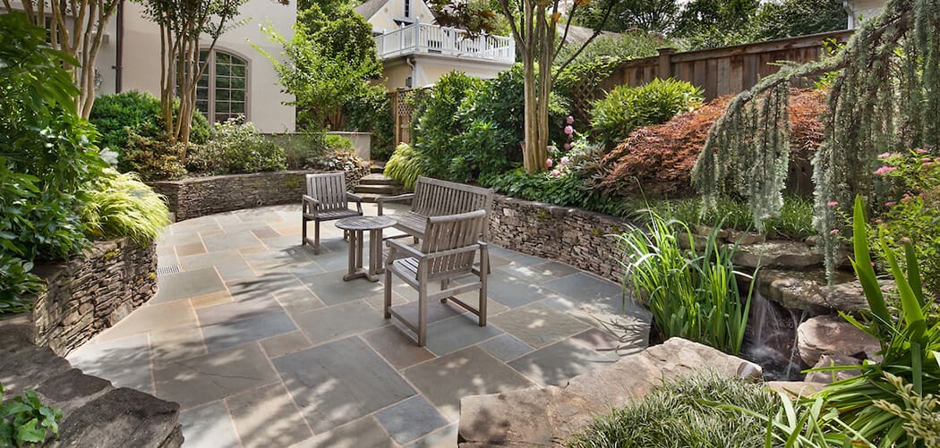 flagstone patio and stacked stone retaining walls