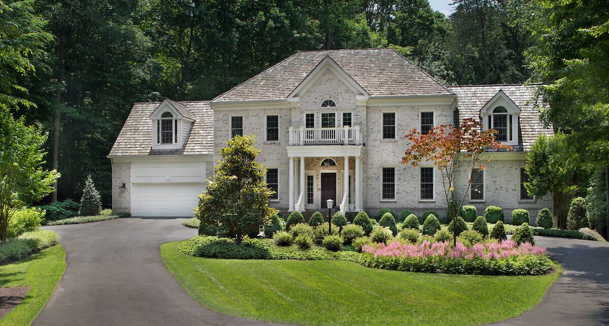 03 front yard landscaping style with circular driveway Surrounds
