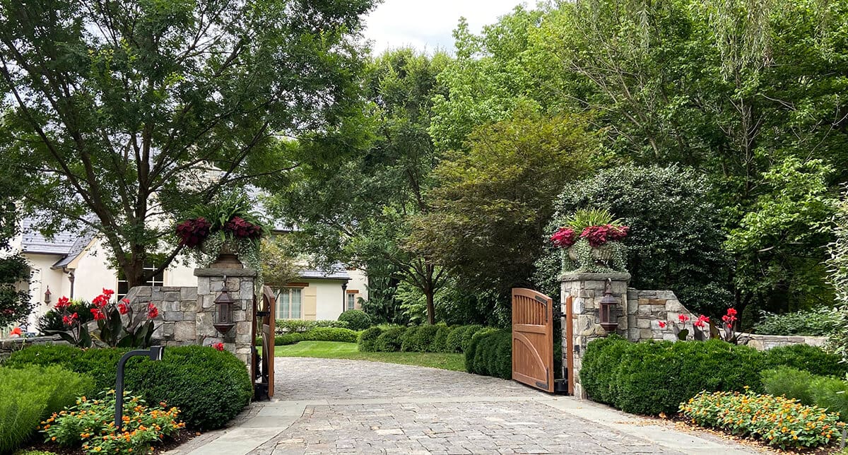 low border blooming flowers along driveway