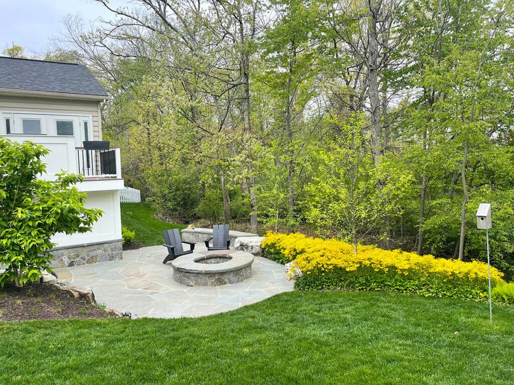 backyard patio that extends to side yard