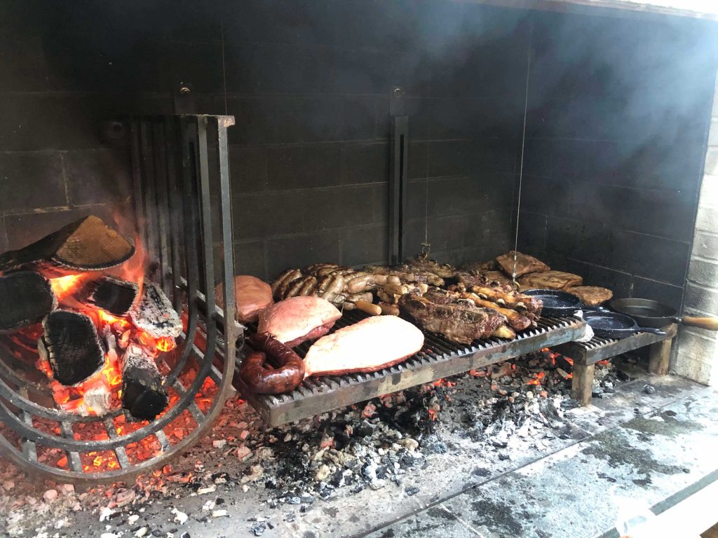 cooking meat on the parrilla